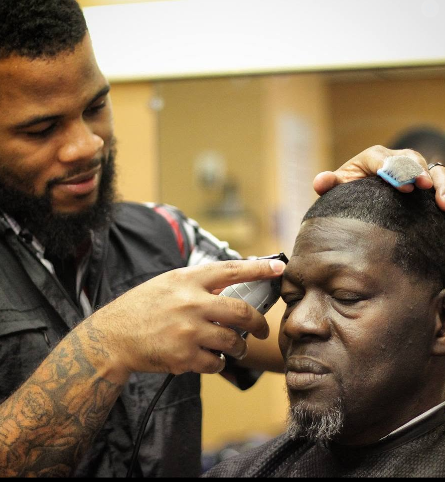 Barber working a clean cut